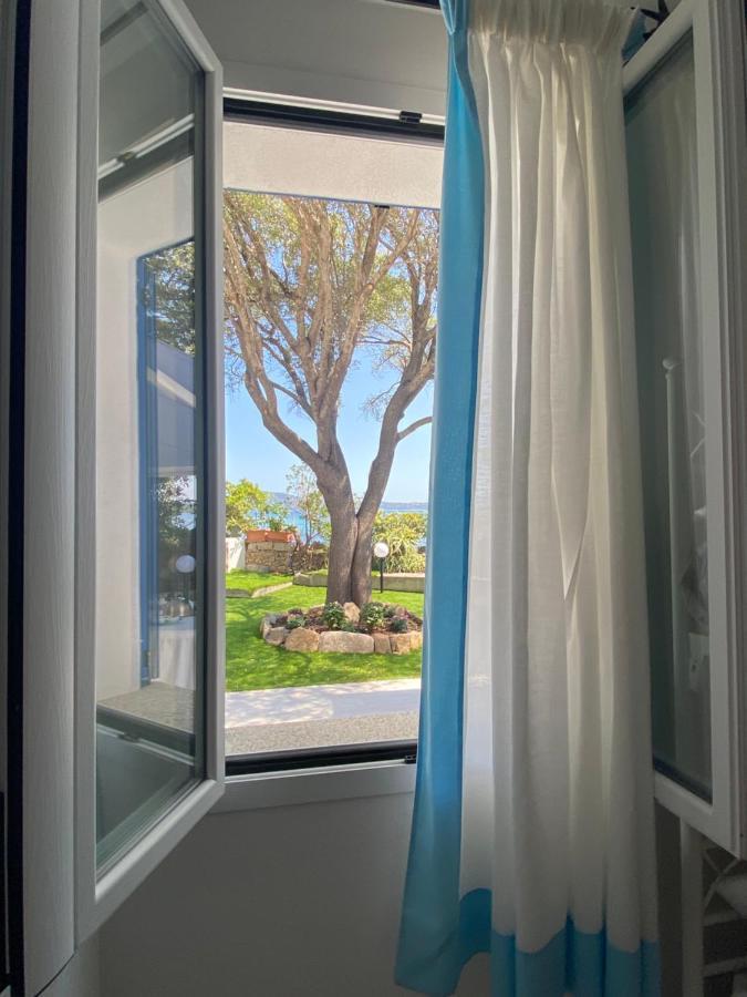 La Casa Sull'Acqua Villa ออลเบีย ภายนอก รูปภาพ